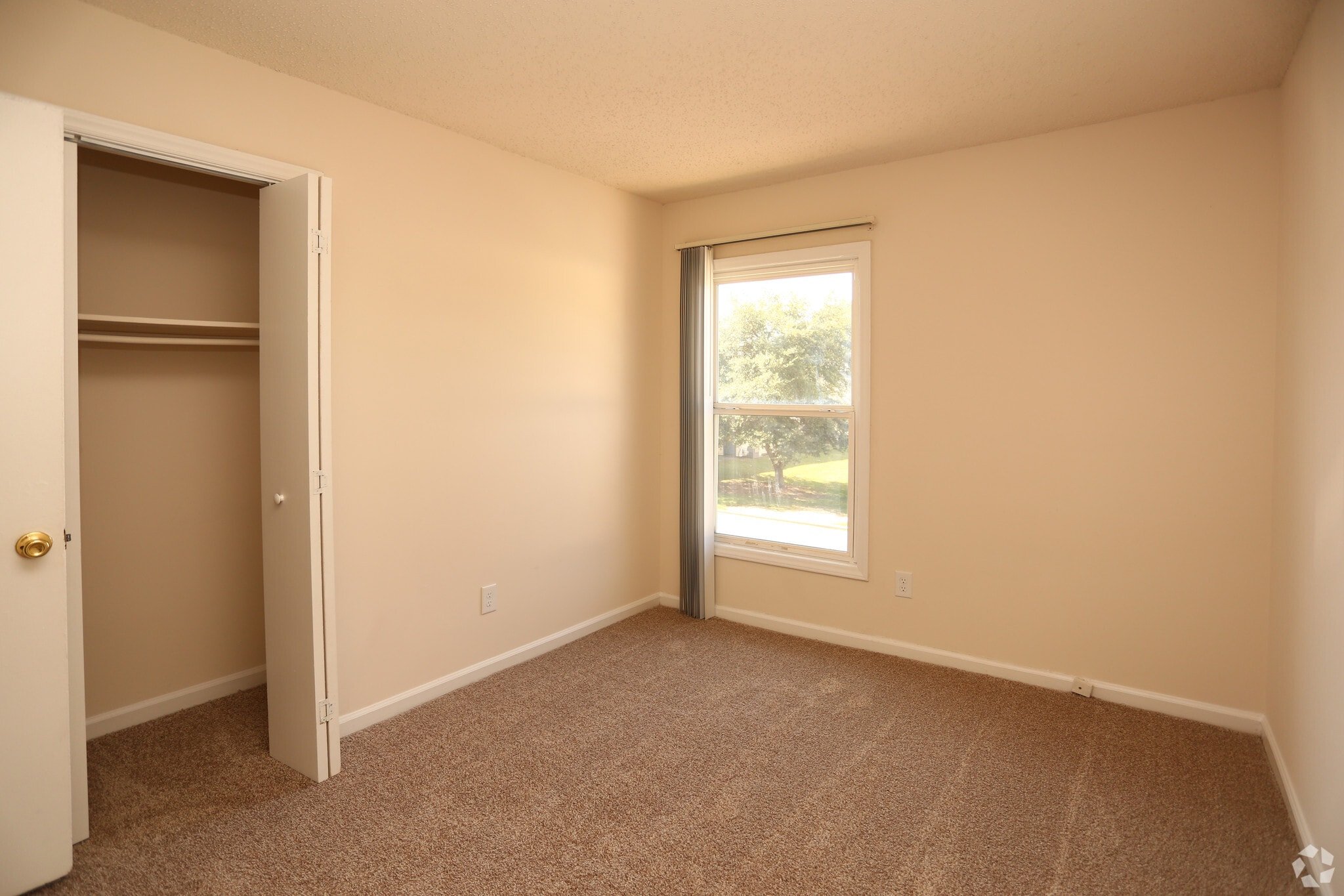 Carpeted bedroom